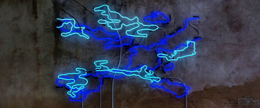A blue neon artwork on a dark background.